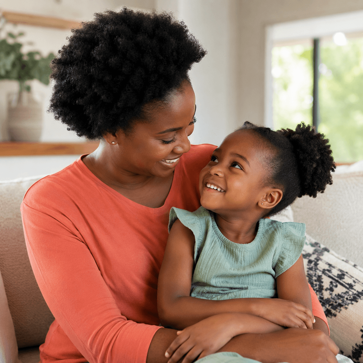 Parent and child sharing a positive moment for the Parenting programme